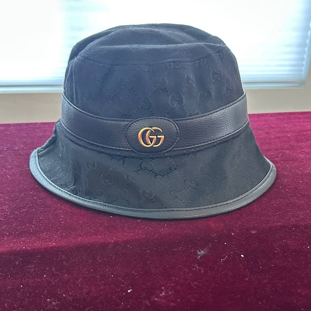Gucci Black Bucket Hat with Gold Emblem
